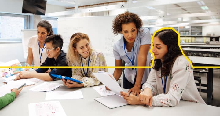 students and instructors collaborating in a classroom