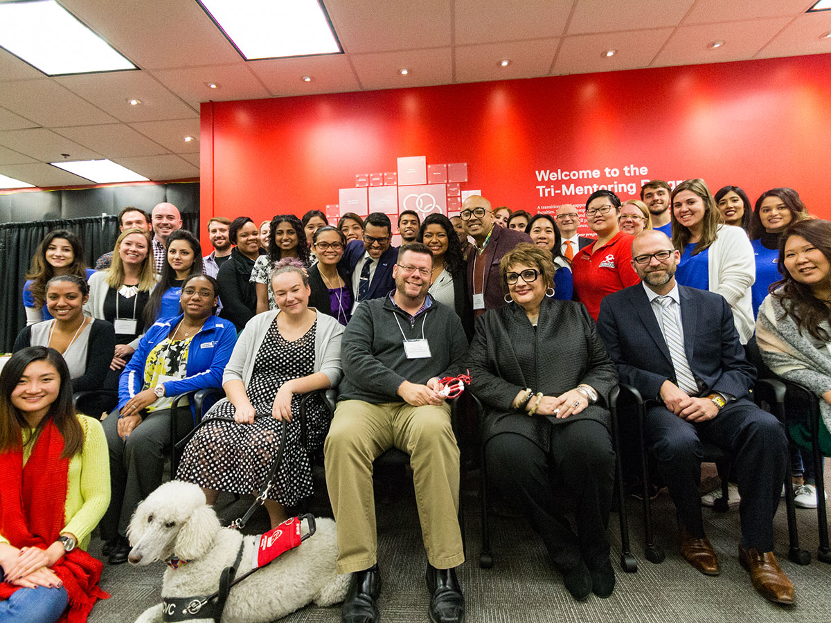 Group of people at Tri-Mentoring Program event