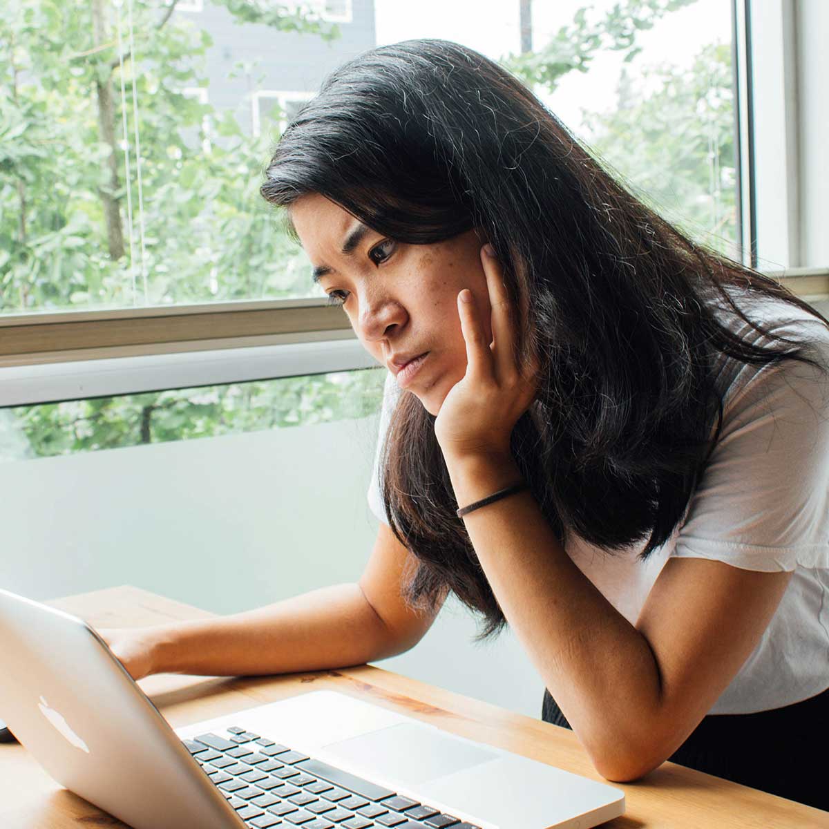 Person looking at a laptop